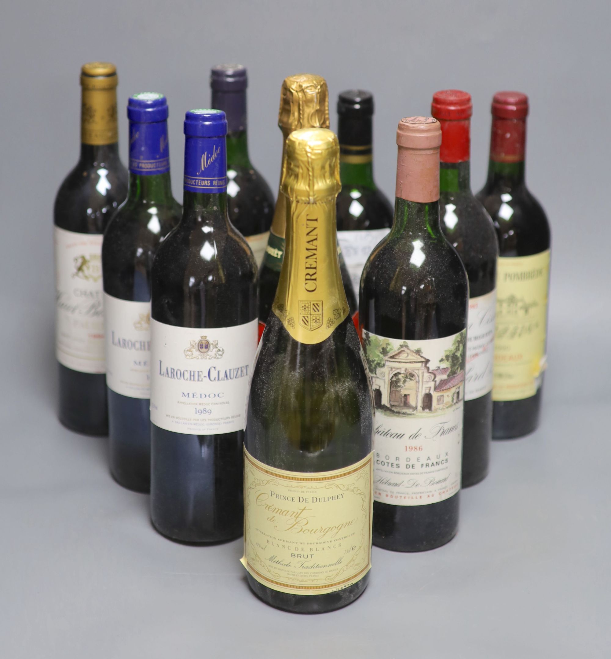 Eight assorted wines including Chateau Batailley 1994, one NV Champagne and one sparkling wine.